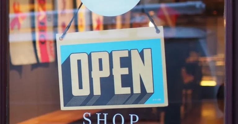 Open sign on a local small business storefront