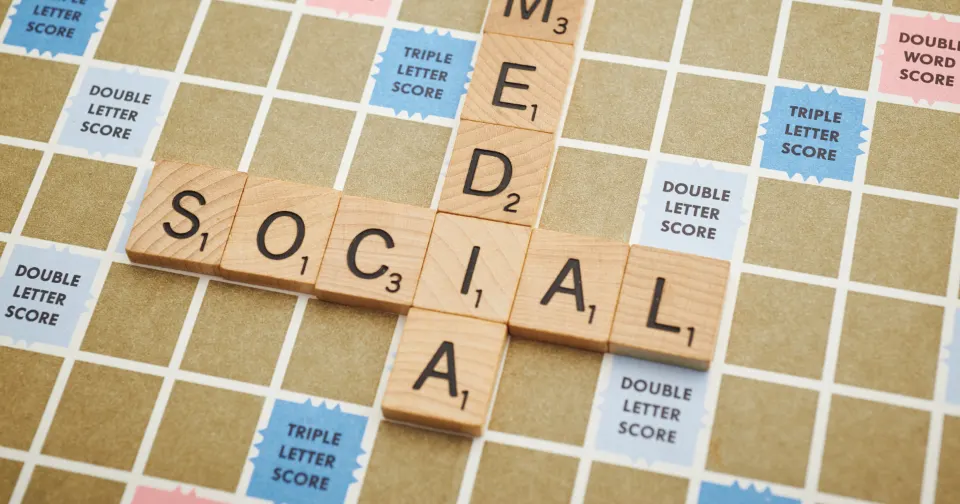 Social media spelled out in letter tiles