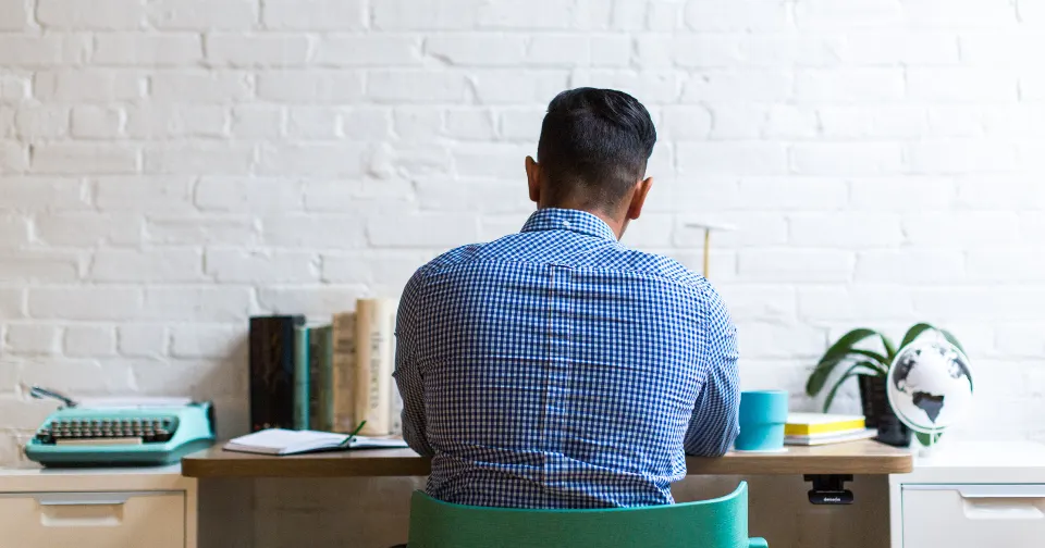 Small business owner doing website maintenance at a desk